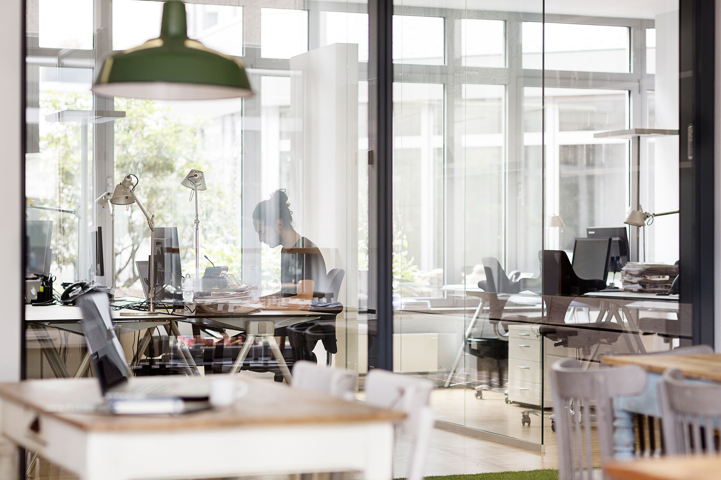 man-working-in-modern-office-behind-glass-wall-2026-01-05-00-44-33-utc23
